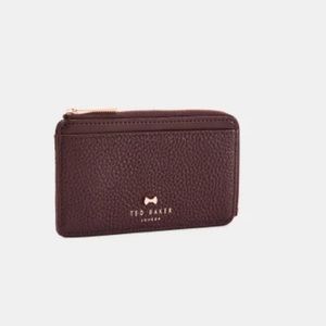 LOTTA
Bow detail leather card holder